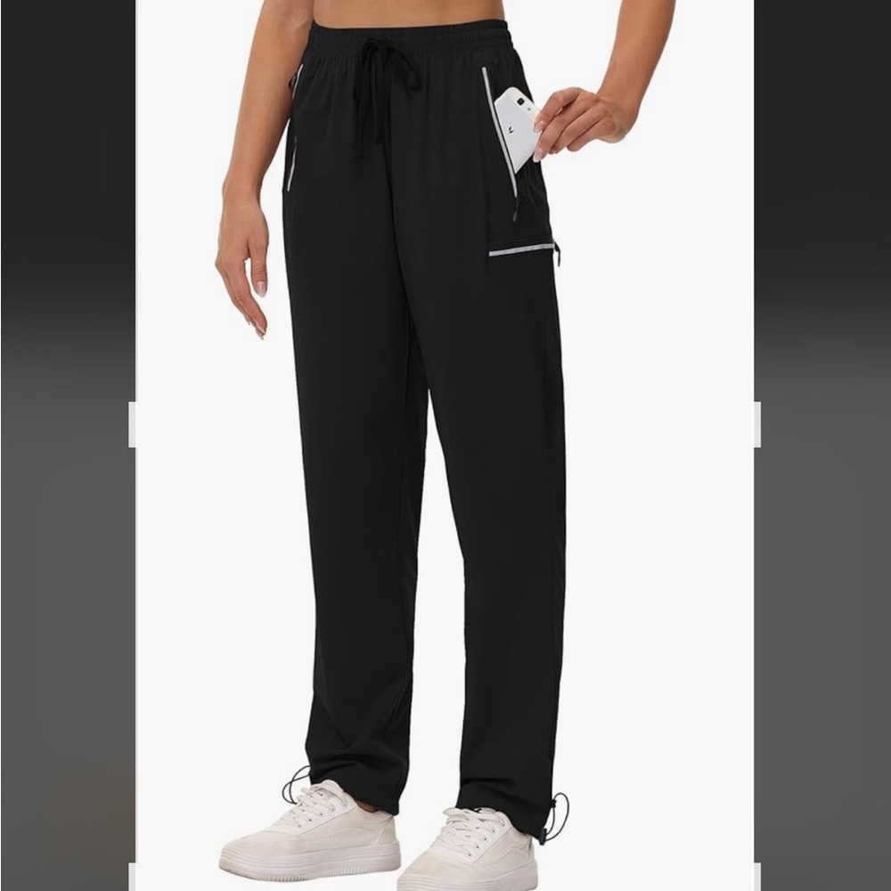 NWT Hiking pants for wet weather. Bottom have drawstring